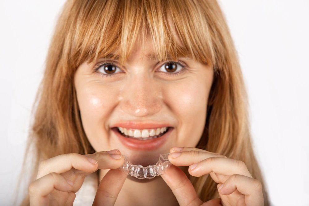 girl wearing invisalign