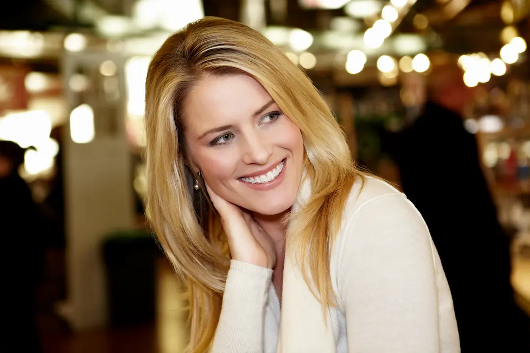 Beautiful woman smiling with invisalign