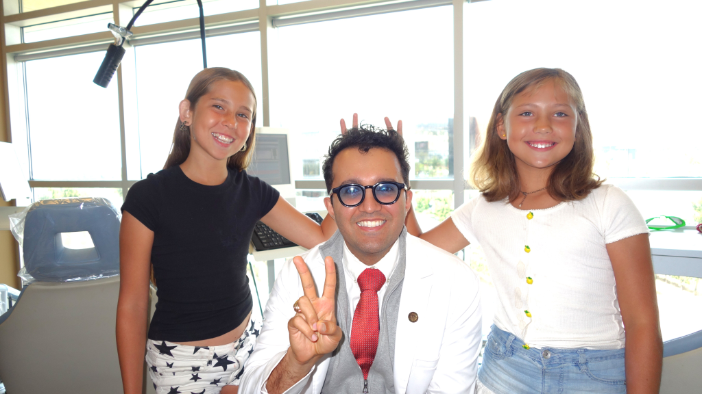 Northridge Orthodontist patient smiling after braces treatment at Dadjoo Orthodontics